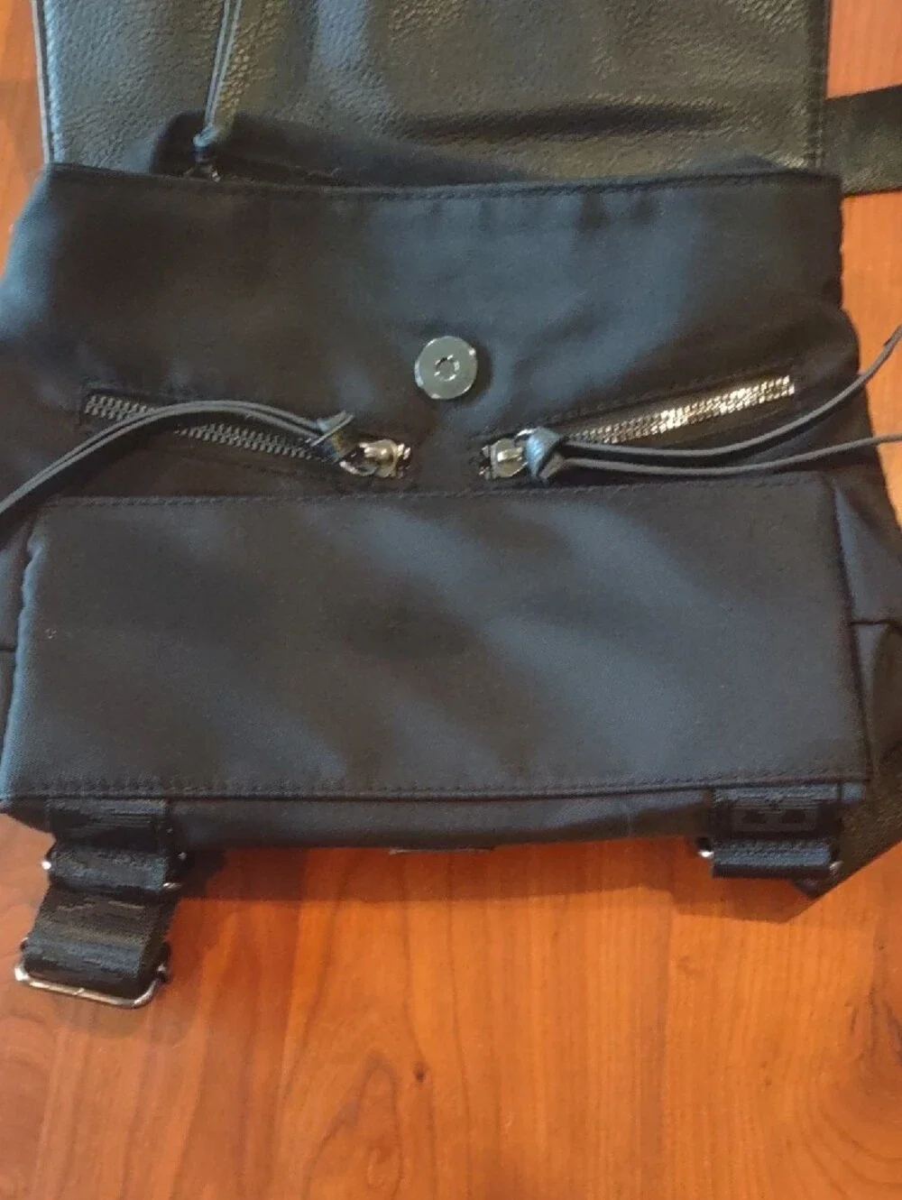 Botkier Black Backpack with Textured Flap, Adjustable Straps And Zip Pockets